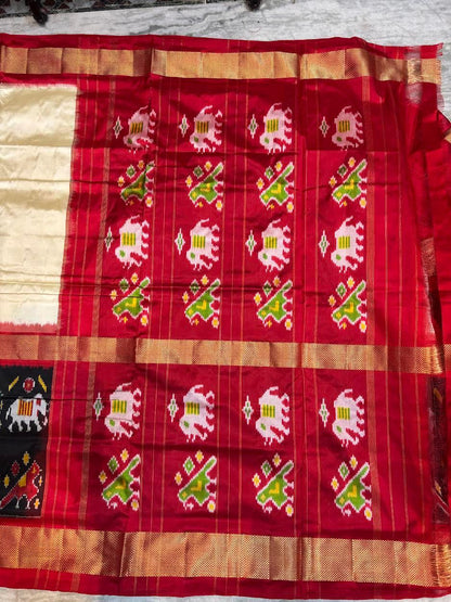 Traditional Cream &amp; Red Ikkat Silk Saree with Black Elephant Motif Border | Pochampally Handloom - pochampallysarees.com