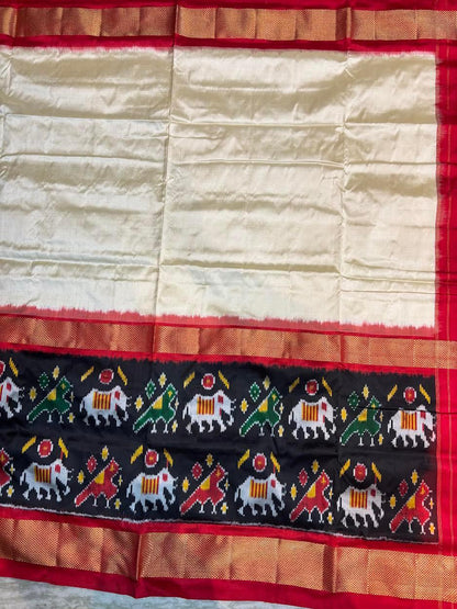 Traditional Cream &amp; Red Ikkat Silk Saree with Black Elephant Motif Border | Pochampally Handloom - pochampallysarees.com