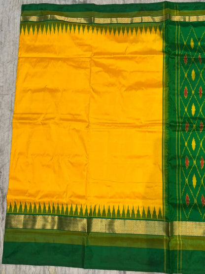 Pure Ikkat Silk Saree in Vibrant Yellow &amp; Emerald Green | Traditional Temple Border with Woven Zari - pochampallysarees.com