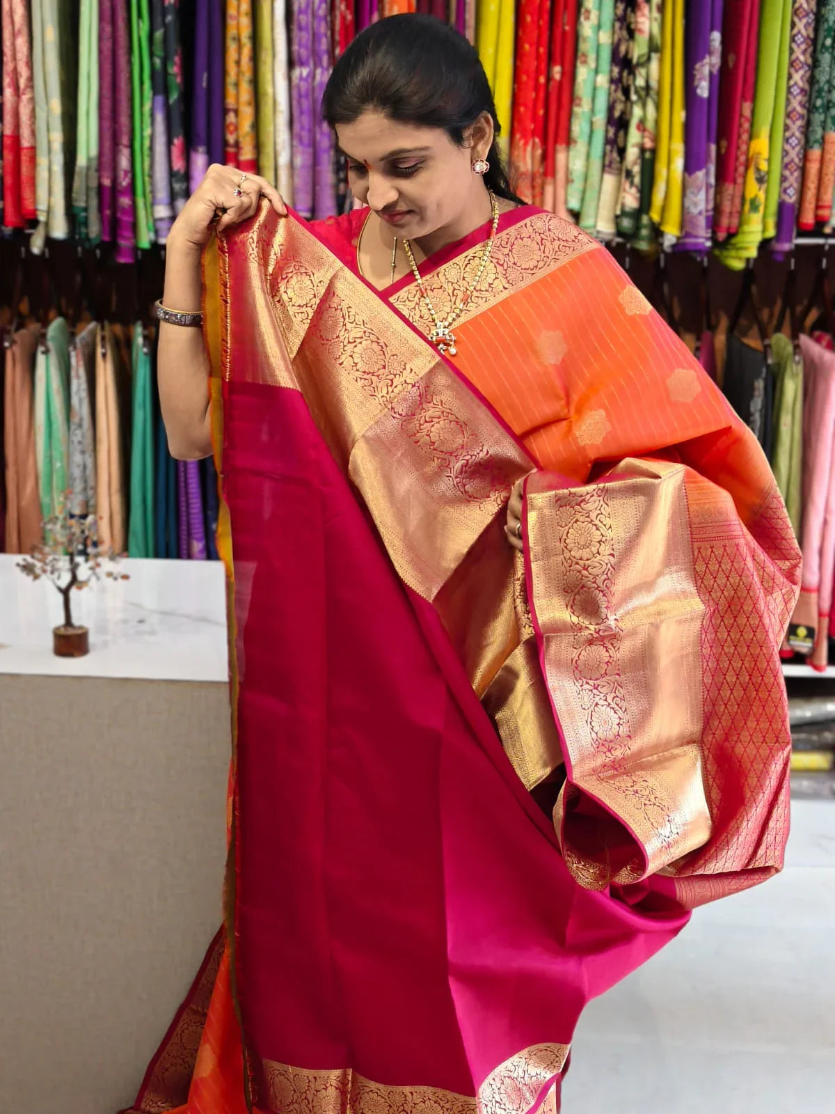 Pure kanchipuram tissue silk saree Orange with Red Checks floral design motif and long rich floral design border - pochampallysarees.com