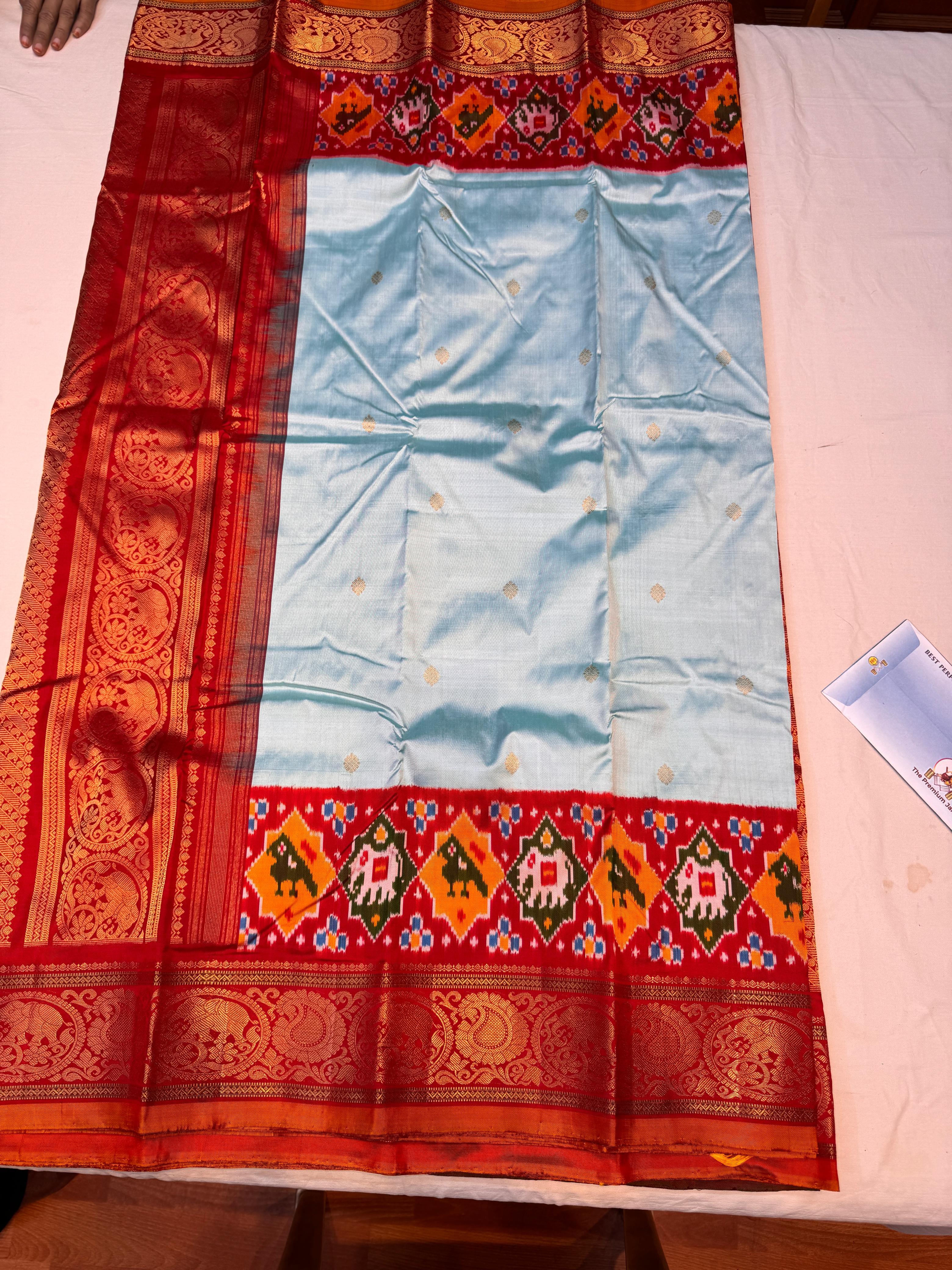 Pochampally Kanchi Fusion Silk Saree | Sky Blue with Red Ikat Border &amp; Kanjeevaram Pallu | Handloom Bridal &amp; Festive Wear - pochampallysarees.com