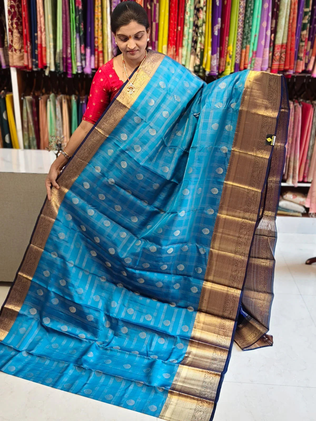 Pure kanchipuram tissue silk saree Ananda Blue with Naviblue Checks floral design motif and long rich floral design border - pochampallysarees.com