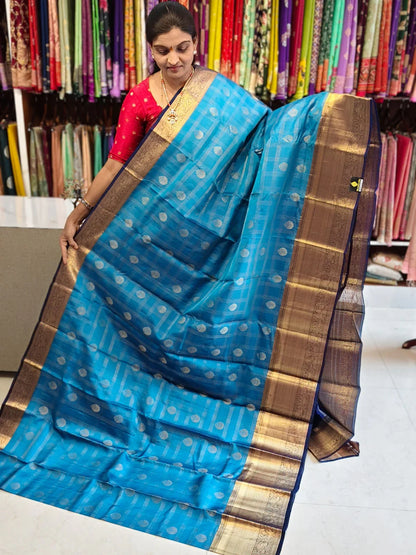 Pure kanchipuram tissue silk saree Ananda Blue with Naviblue Checks floral design motif and long rich floral design border - pochampallysarees.com
