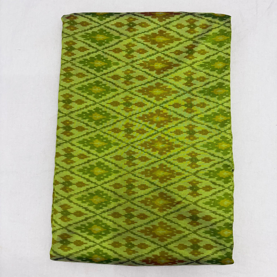 HAND WOVEN DOUBLE IKAT SOFT SILK PARROT GREEN FABRIC - pochampallysarees.com