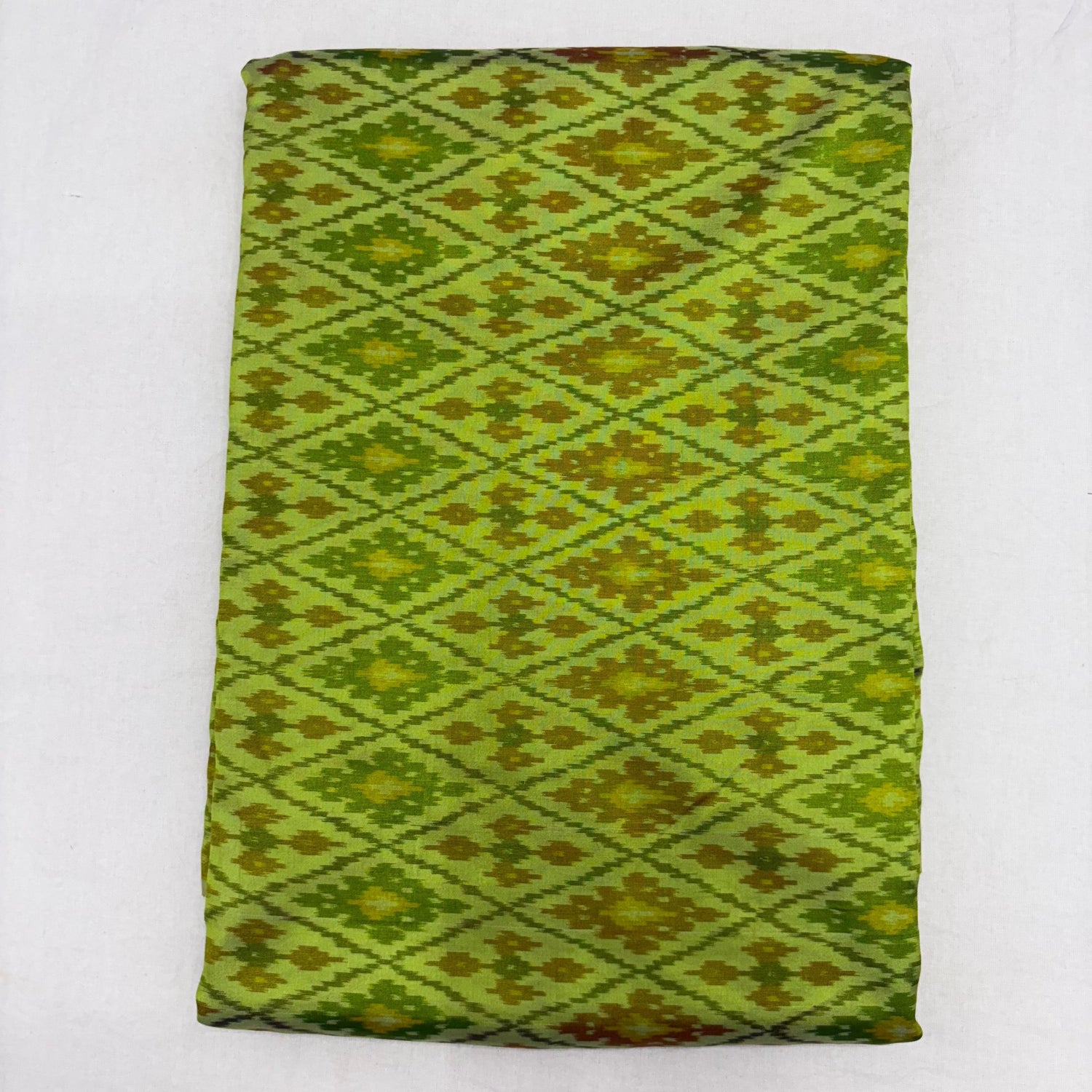 HAND WOVEN DOUBLE IKAT SOFT SILK PARROT GREEN FABRIC - pochampallysarees.com