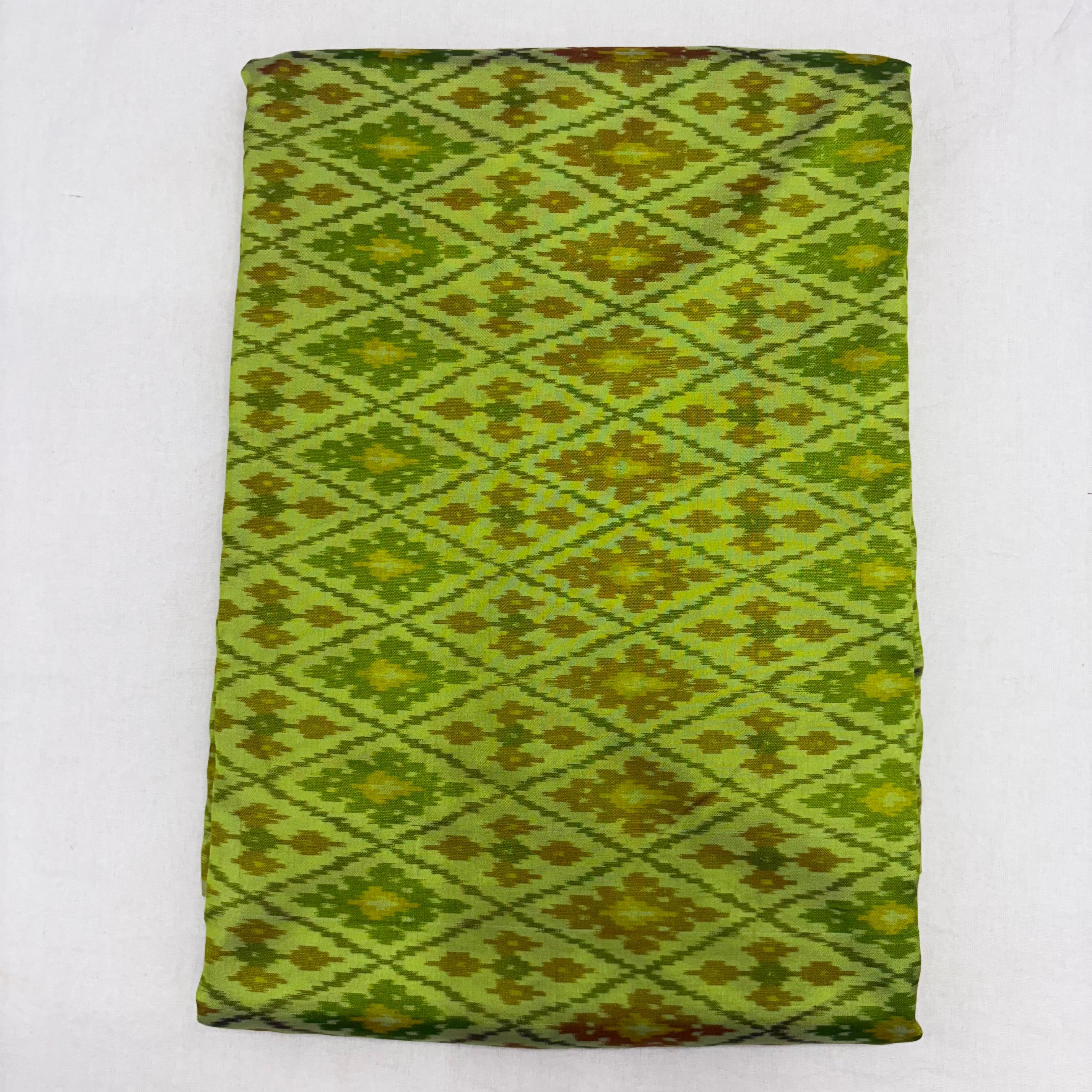 HAND WOVEN DOUBLE IKAT SOFT SILK PARROT GREEN FABRIC - pochampallysarees.com
