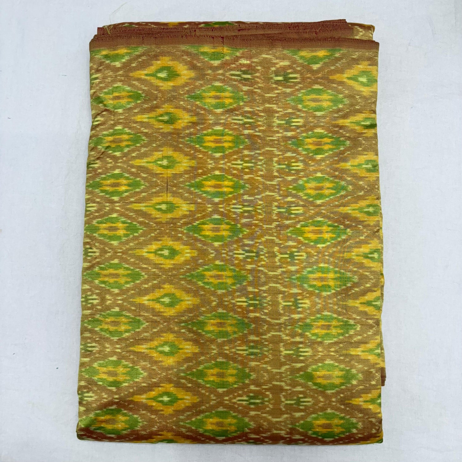 HAND WOVEN DOUBLE IKAT SOFT SILK PARROT GREEN FABRIC - pochampallysarees.com