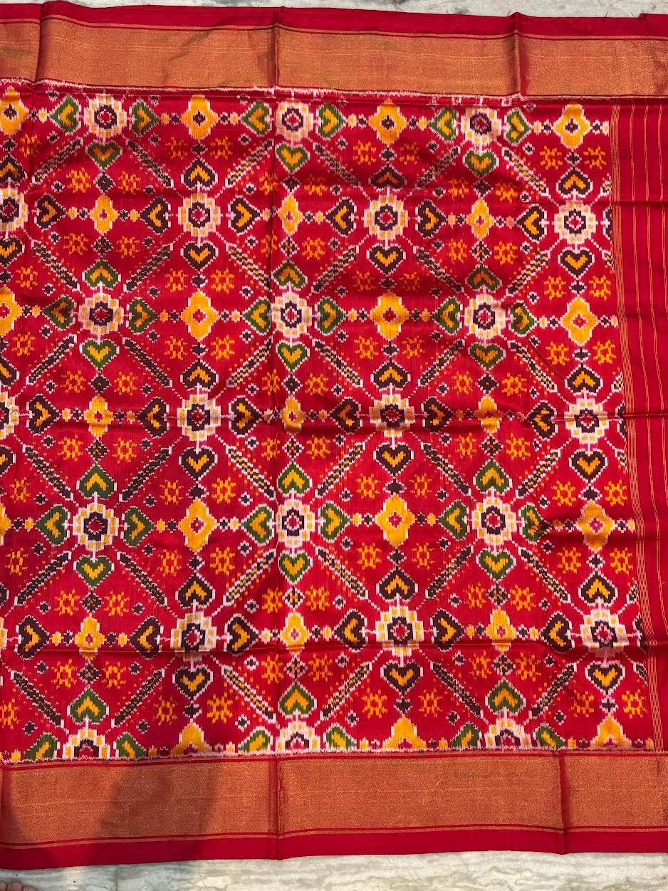 Pure Pochampally Ikkat Patola Silk Saree in Crimson Red – Handwoven Geometric Heart &amp; Diamond Pattern with Gold Zari Border | Traditional Festive &amp; Wedding Wear - pochampallysarees.com