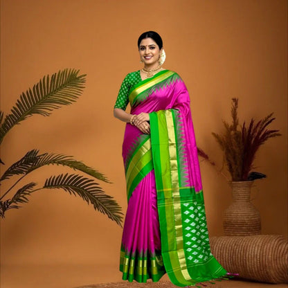 Pochampally Ikkat Silk Sari with Pink Border featuring a rich green pallu and matching ikkat blouse. A premium handwoven silk sari for festive wear.