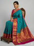 Elegant Teal Blue Pure Gadwal Silk Saree with Contrast Rani Pink Zari Border & Pallu - pochampallysarees.com