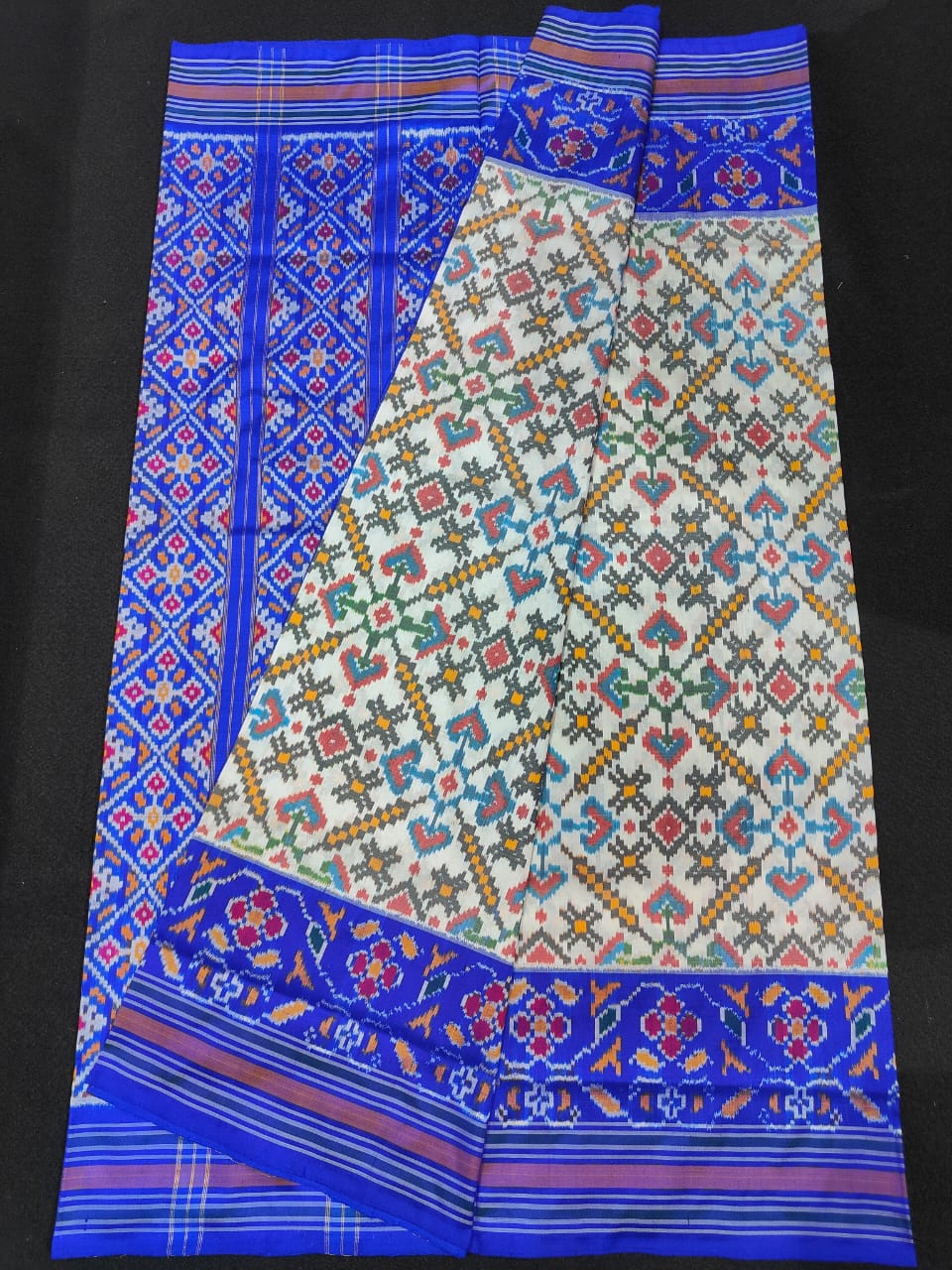 Pochampally Ikkat Silk Patola Cream With Blue Sari