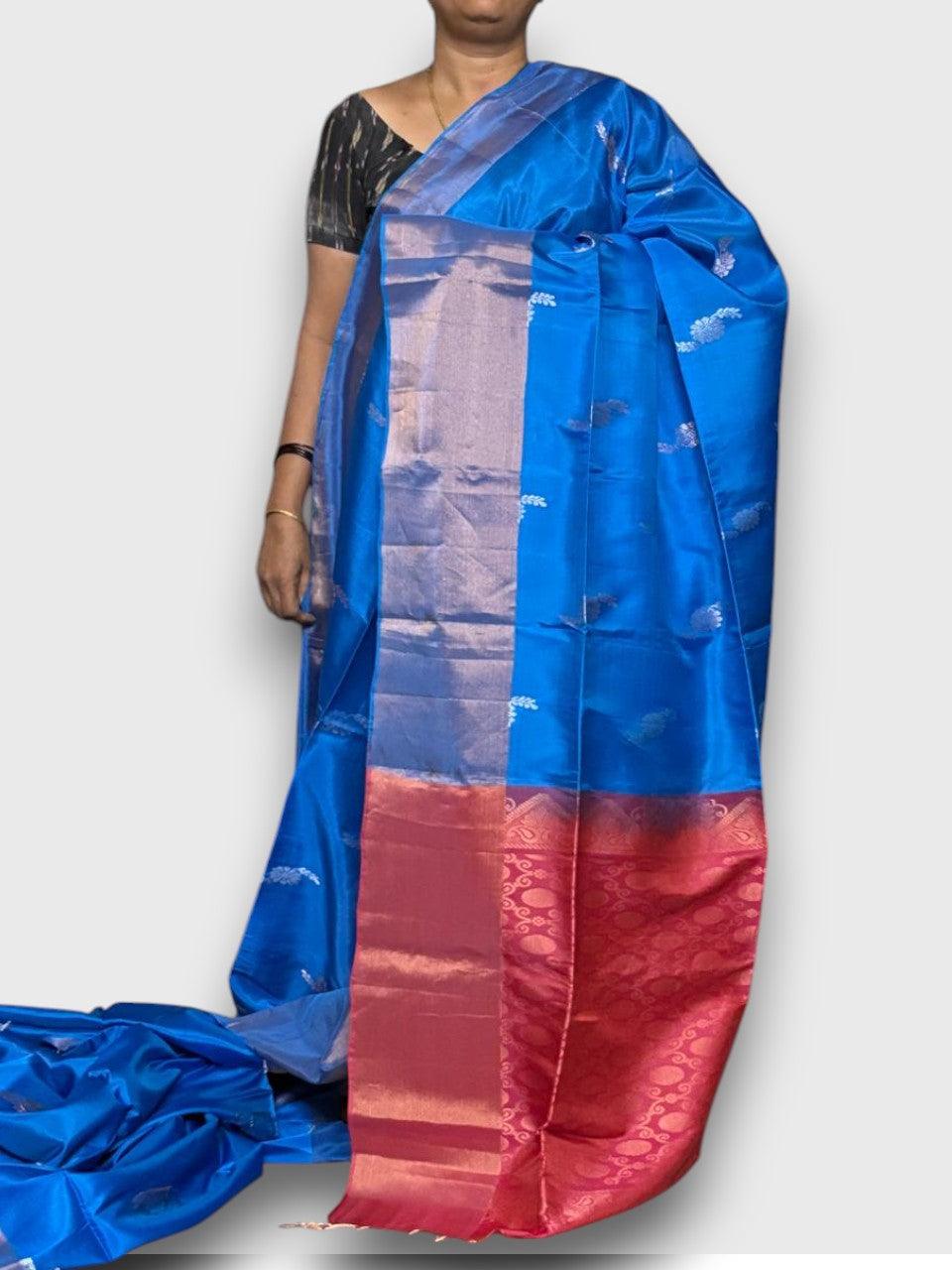 PURE SOFT SILK SAREE ANANDA BLUE AND RED WITH ALLOVER ZARI WEAVES BUTTAS IN TISSUE BORDER STYLE