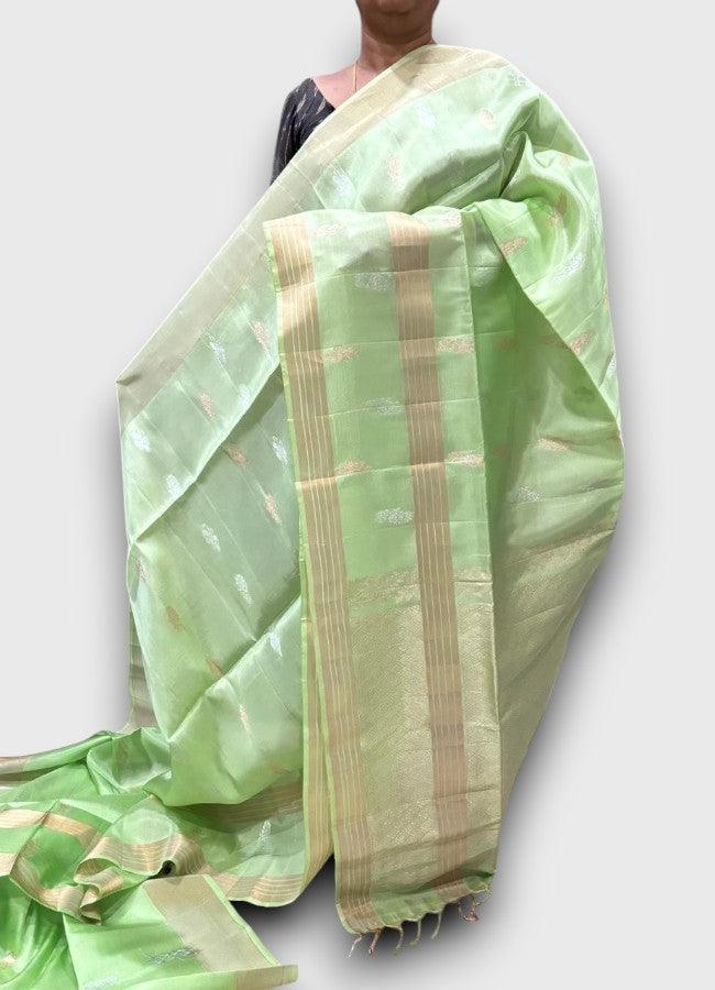 PURE SOFT SILK SAREE LIGHT GREEN WITH ALLOVER ZARI WEAVES BUTTAS IN PLAIN BORDER