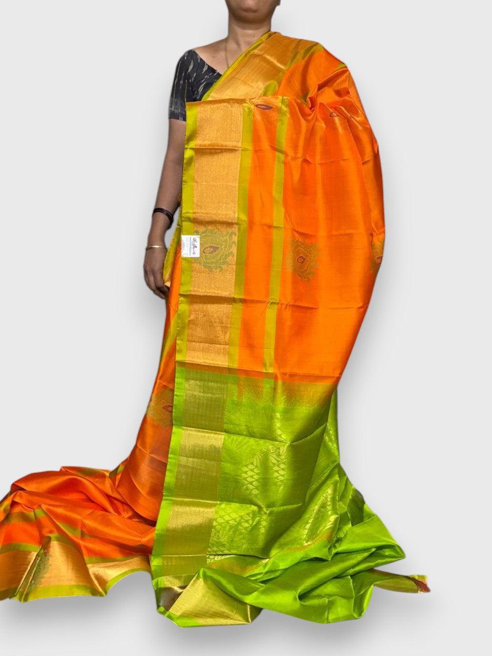 PURE SOFT SILK SAREE ORANGE AND GREEN WITH ALLOVER ZARI WEAVES BUTTAS IN BORDER TISSUE STYLE