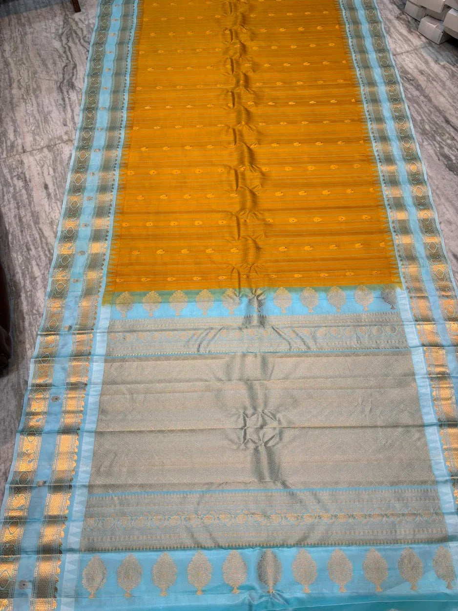 Pure Gadwal Silk Saree in Mustard Yellow &amp; Sky Blue | Rich Zari Pallu &amp; Striped Body | Traditional Handloom Pattu for Weddings - pochampallysarees.com
