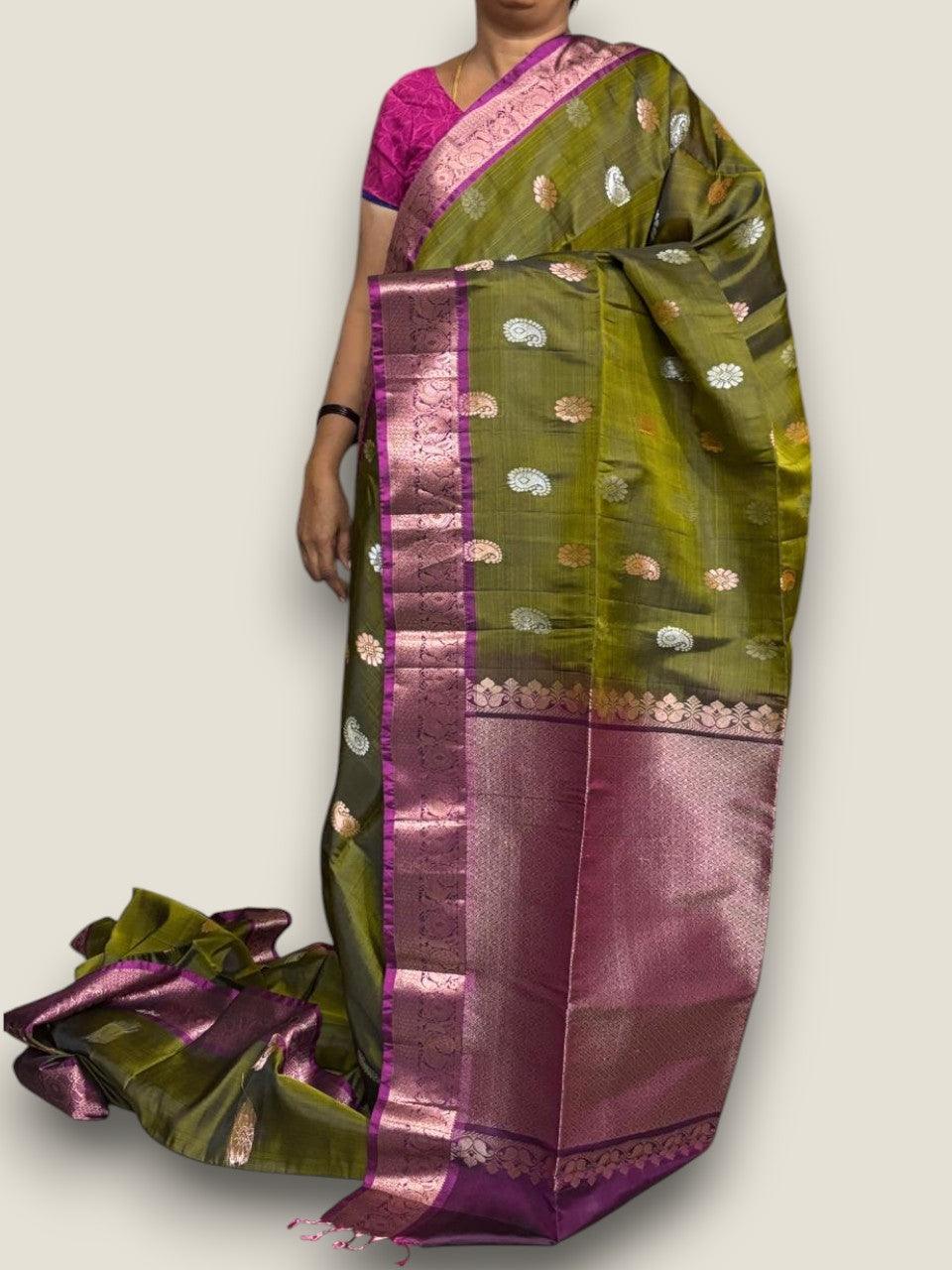 PURE SOFT SILK SAREE OLIVE GREEN AND PURPLE WITH ALLOVER ZARI WEAVES BUTTAS IN KANCHI BORDER STYLE