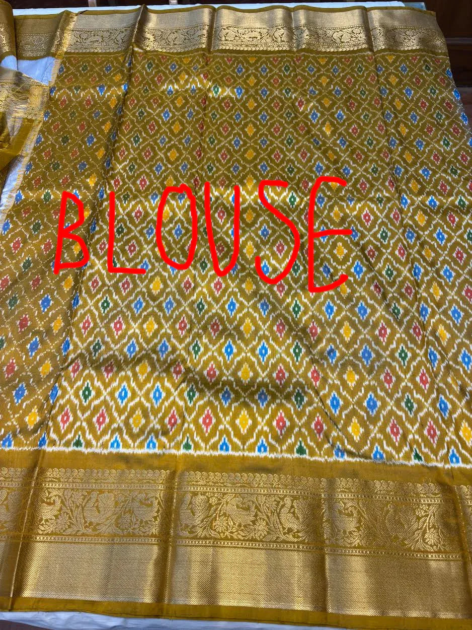 Premium Silver Kanchi Ikkat Silk Saree with Rich Gold Zari Border | Traditional Elephant Motif Pattu Saree for Weddings &amp; Festivals - pochampallysarees.com