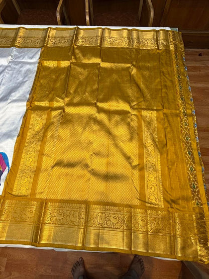 Premium Silver Kanchi Ikkat Silk Saree with Rich Gold Zari Border | Traditional Elephant Motif Pattu Saree for Weddings &amp; Festivals - pochampallysarees.com