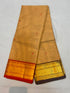 Handloom biscuit beige pure Kanchi cotton saree with red floral buttas and dual-tone Ganga Jamuna zari borders in red and dark brown