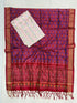 Burgundy and cream Pochampally Ikat silk unstitched dress material set featuring a geometric step-patterned top, a detailed diamond lattice and temple border, and knotted tassels.