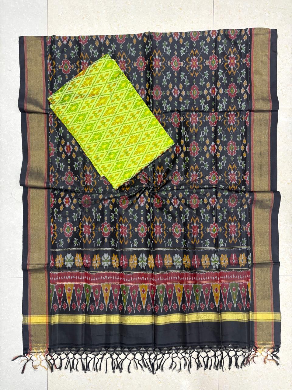 Handloom charcoal black pure Pochampally Ikat silk saree with floral geometric pallu and contrast lime green blouse piece