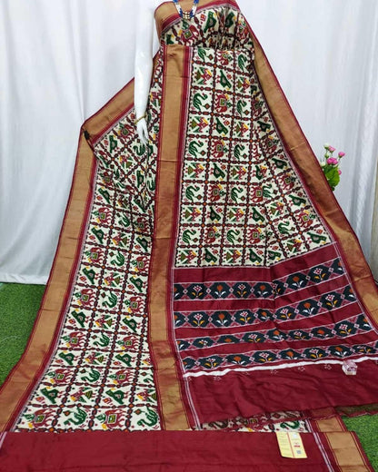 Double Ikkat Patola White With Maroon Color Saree - pochampallysarees.com