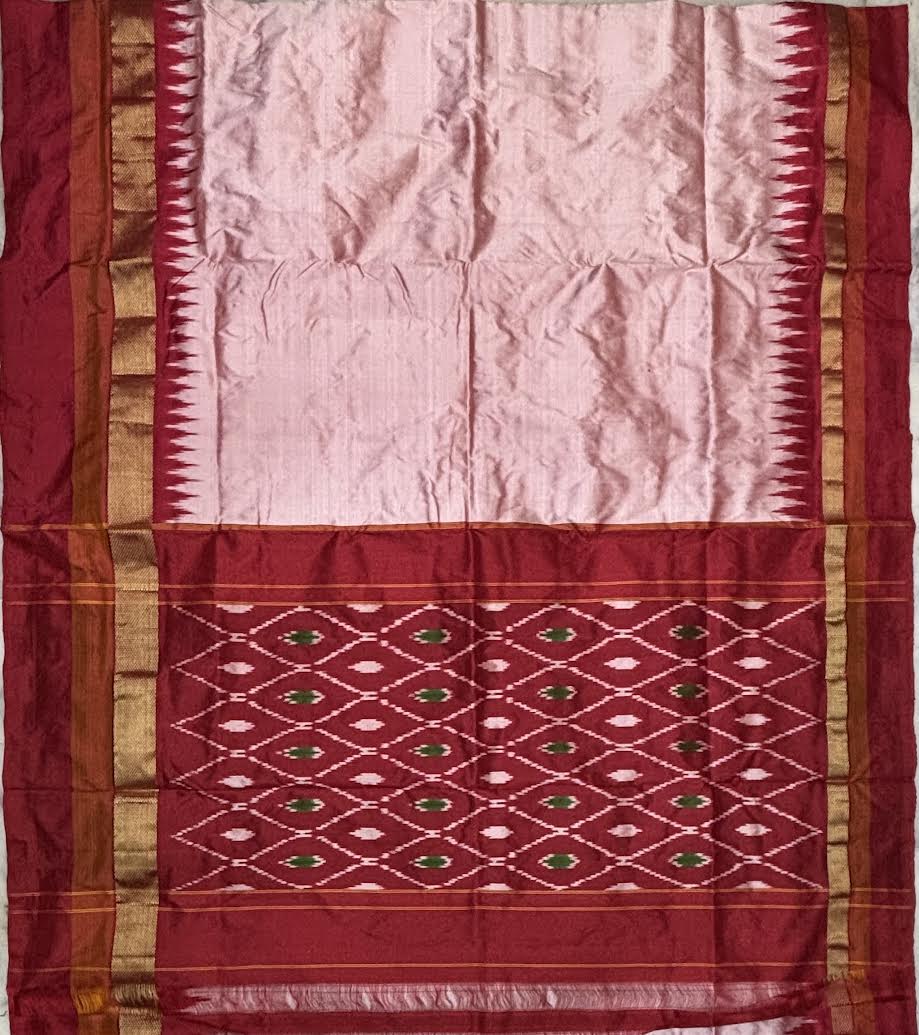 Elegance in Red and White: Traditional Indian Woman in a Phoda Temple Ikat Saree