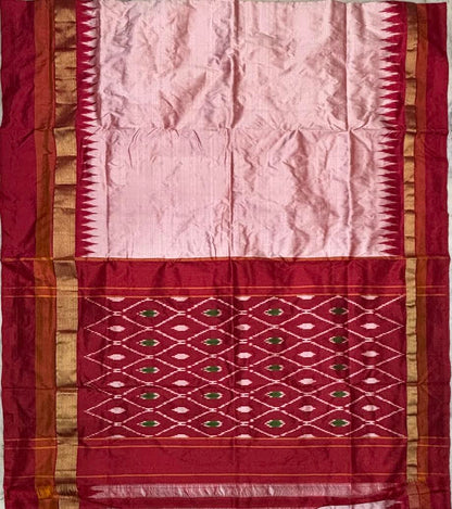 Elegance in Red and White: Traditional Indian Woman in a Phoda Temple Ikat Saree