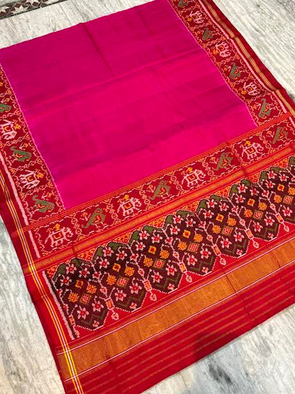 Vibrant Magenta Pure Real Patola Silk Saree with Red Elephant Motif Border