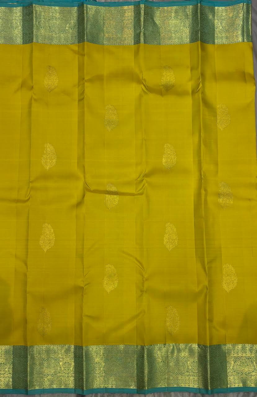 Authentic Green Kanchipuram Pattu Silk Saree with Teal Border - pochampallysarees.com