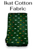 Folded forest green Ikat cotton fabric displaying traditional horizontal woven motifs in white, orange-red, and mustard yellow.