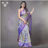 Model wearing a grey and purple handloom Pochampally Ikkat pure silk saree with geometric patterns
