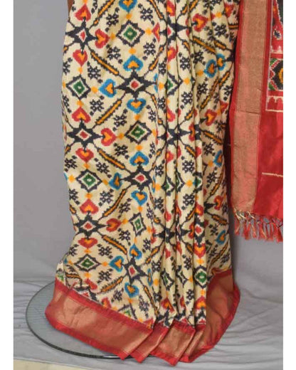 HAND WOVEN POCHAMPALLY DOUBLE IKKAT PANPATOLA CREAM COLOR SILK SAREE - pochampallysarees.com