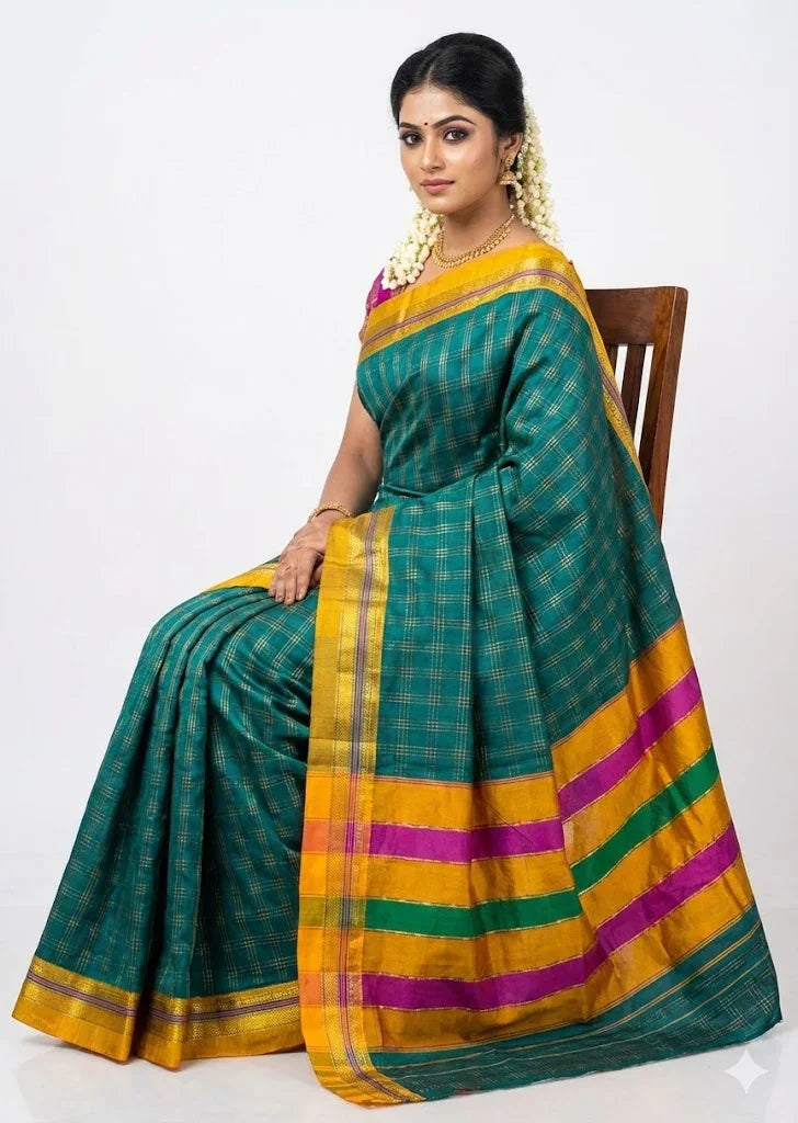 Traditional Deep Green Kuppadam Pattu Silk Saree with Gold Zari Checks & Vibrant Striped Pallu - pochampallysarees.com