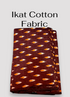 Pochampally ikat cotton fabric online. Pure cotton with vibrant orange motifs, perfect for kurtis, dresses, shirts, and crafts.