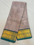 Handloom muted mauve pure Kanchi cotton saree with small teal woven buttas and rich teal border featuring gold zari peacock and chakra motifs