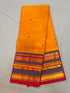 Mustard yellow Kanchi cotton saree with charcoal grey and red zari border with running blouse