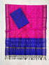 Vibrant pink and royal blue Pochampally Ikat silk unstitched dress material set featuring handwoven curvilinear motifs, a detailed diamond pattern border, and black tassels.