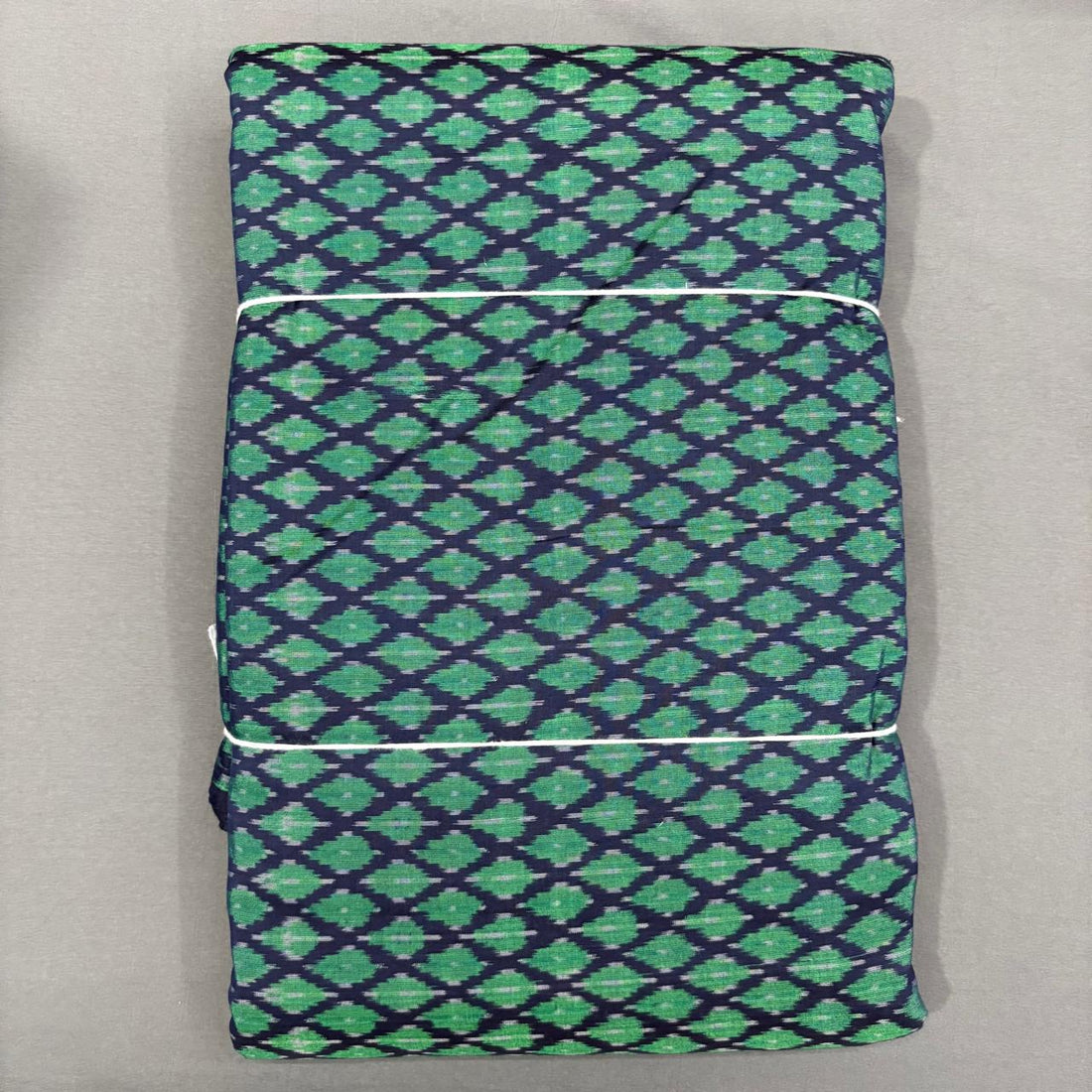 Handwoven Pochampally Ikkat Sico navy blue fabric with emerald green diamond motifs