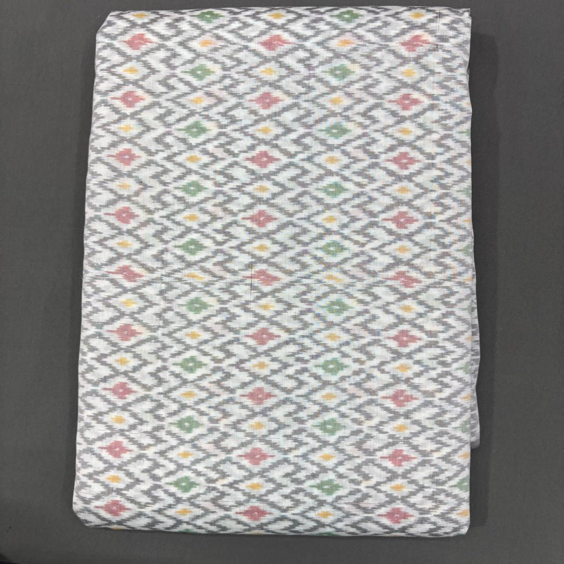 Handwoven Pochampally Ikkat Sico off-white fabric with grey geometric diamond grid and pastel motifs