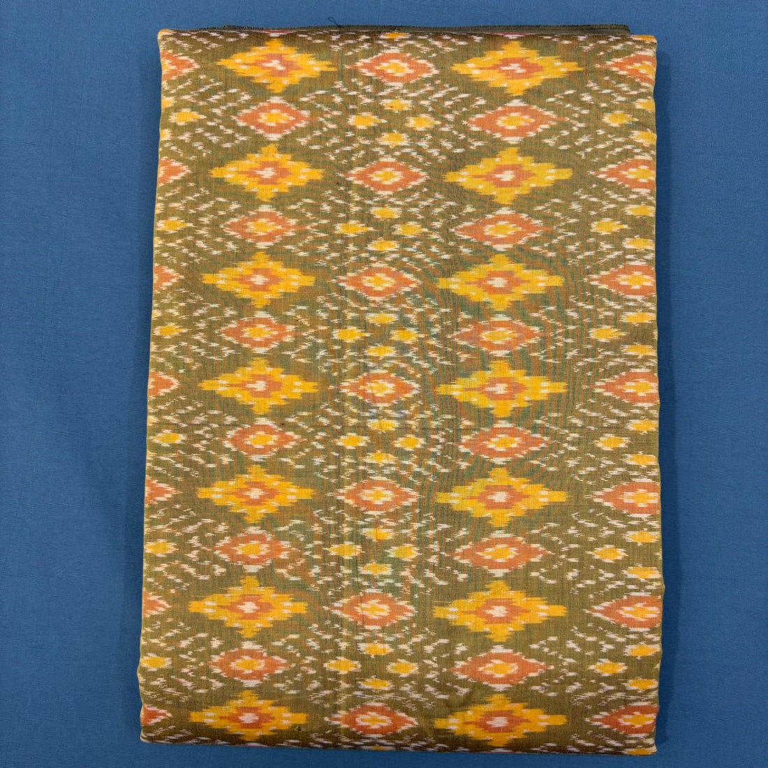 Handwoven Pochampally Ikkat Sico olive green dress material fabric with yellow and peach diamond motifs
