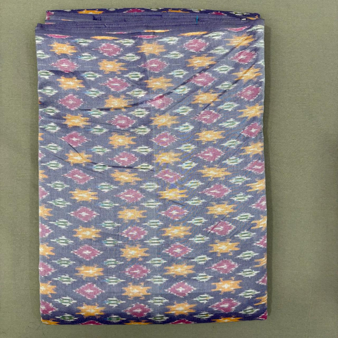 Handwoven Pochampally Ikkat Sico slate lavender fabric with yellow and magenta geometric Ikat motifs