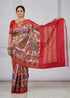 Model wearing hand-woven Ikkat Patola silk saree with elephant Kalamkari print and red Ikat pallu