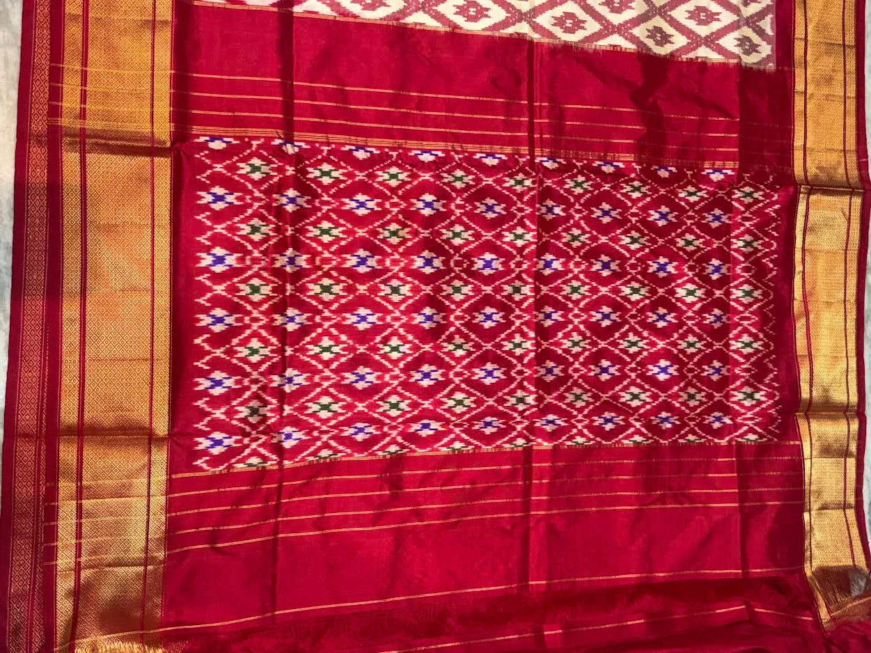 Pure Ikat Silk Patola Saree with Rich Gold Zari Border - pochampallysarees.com