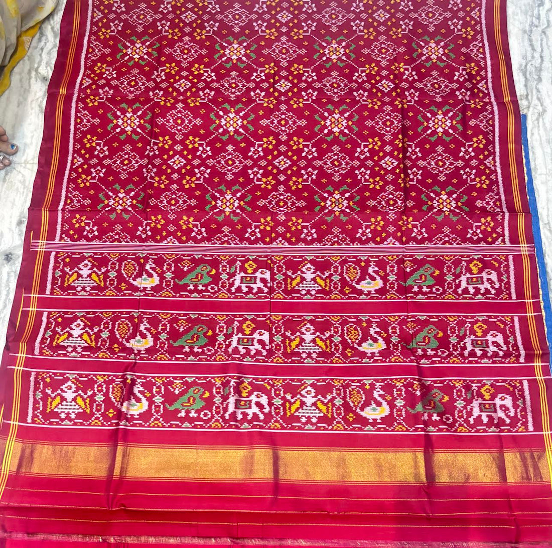 Maroon Real Ikkat Patola Silk Saree with Geometric Weave and Figural Border