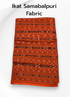 Folded orange and brown Sambalpuri pure cotton dress material Fabric featuring traditional Danti-Bandha Ikat patterns.