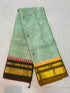 Handloom sea green Kanchi cotton saree with small black floral buttas and dual-tone Ganga Jamuna temple borders with gold zari