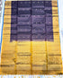 Silk Mark certified midnight purple Kanchi soft silk saree featuring gold zari butis and a heavy gold brocade pallu with tassels