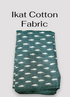 Handloom teal green Pochampally ikat cotton fabric featuring woven off-white geometric dash motifs