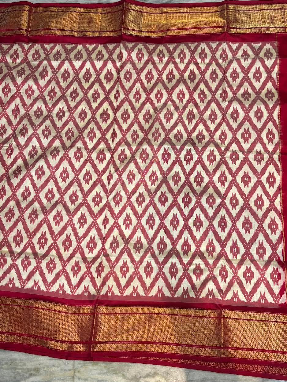 Pure Ikat Silk Patola Saree with Rich Gold Zari Border - pochampallysarees.com